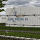 Fuel holding tanks are seen at Colonial Pipeline's Linden Junction Tank Farm on May 10, 2021 in Woodbridge, New Jersey.